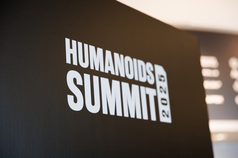 The Humanoids Summit 2025 sign, photographed with a shallow depth of field